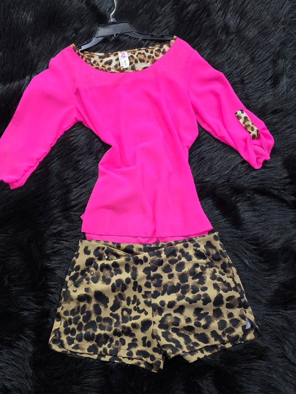 mine Leopard Print  Shorts in Black and Brown Size Small. Blouse Pink Size Med.